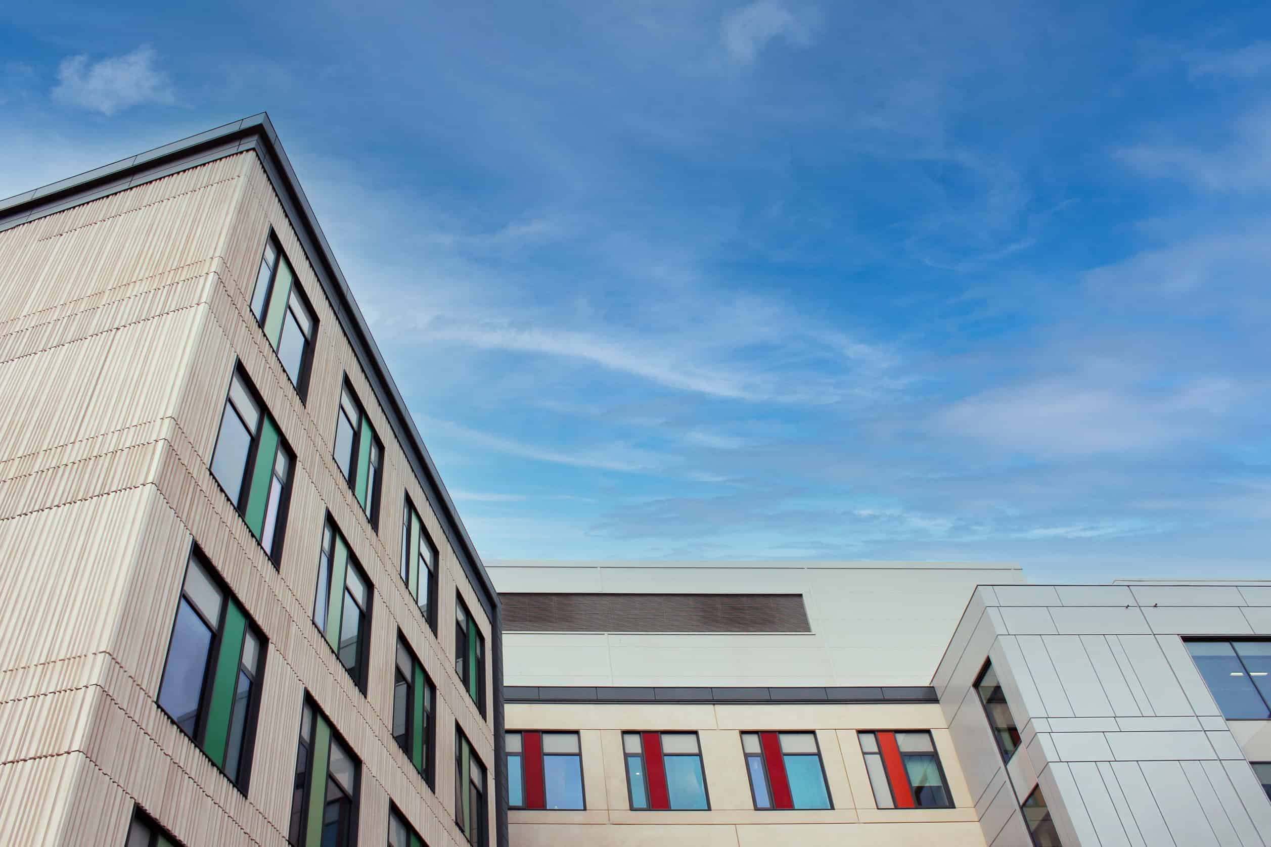 Modern office buildings under clear blue sky