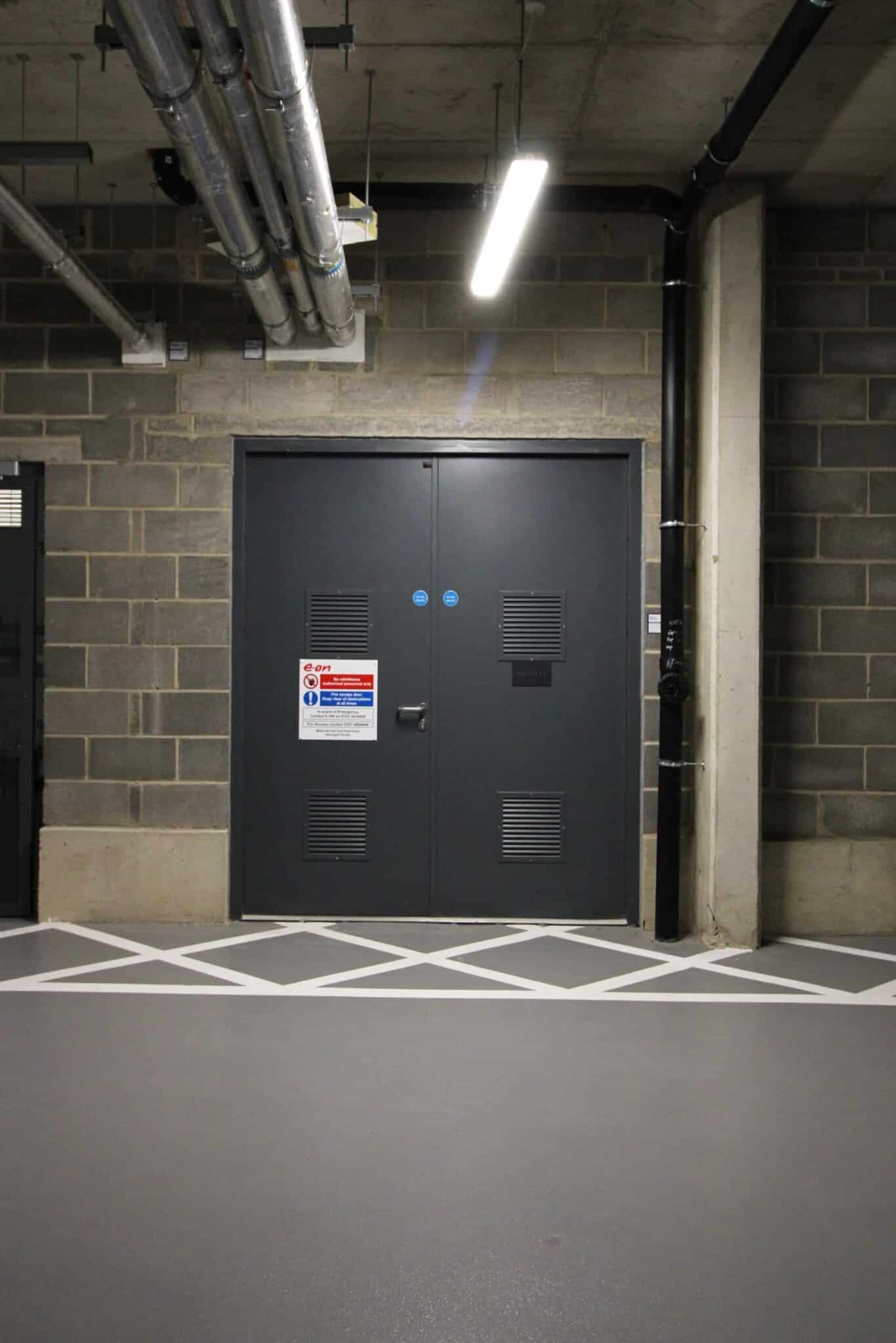 Industrial grey double doors in utility room