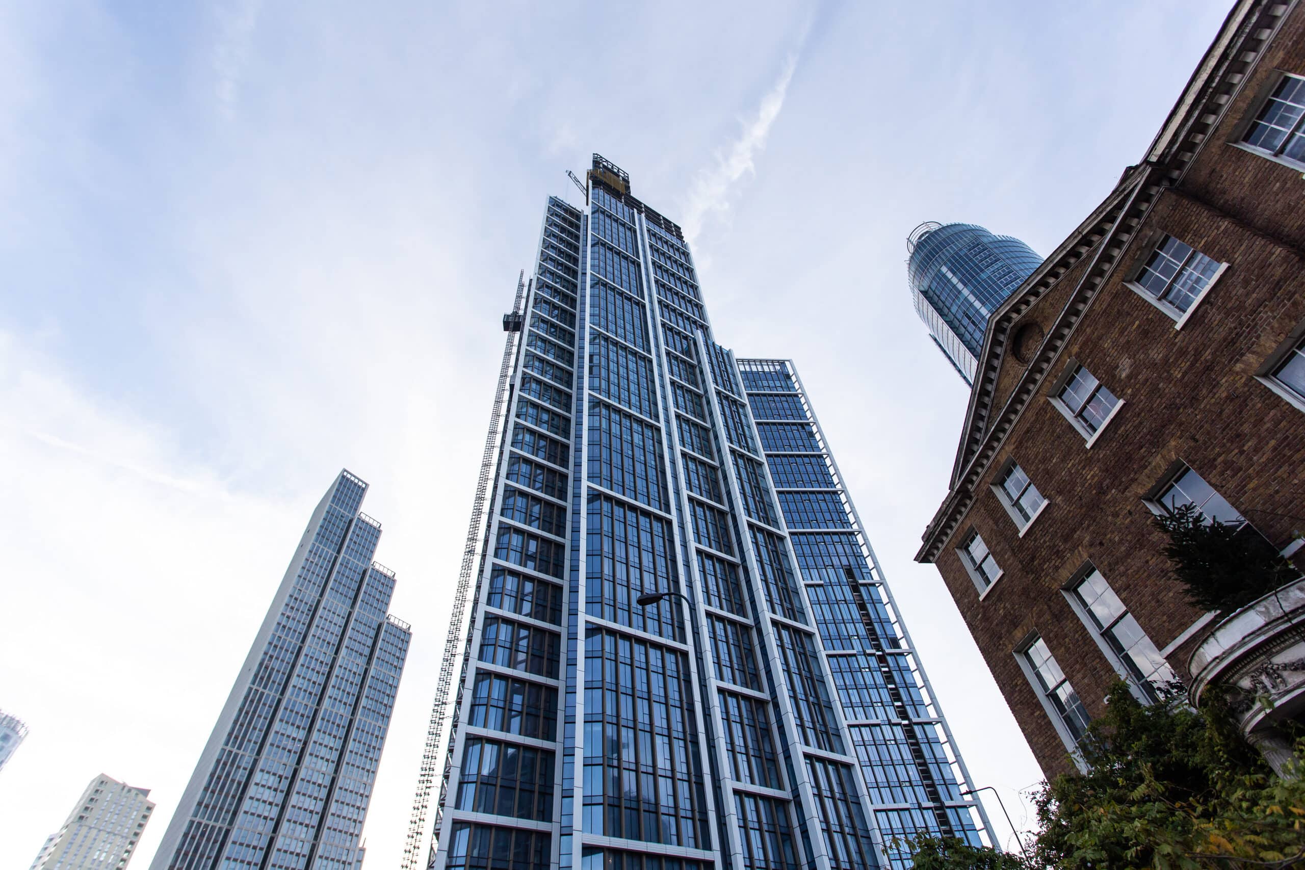 Modern glass skyscrapers against blue sky